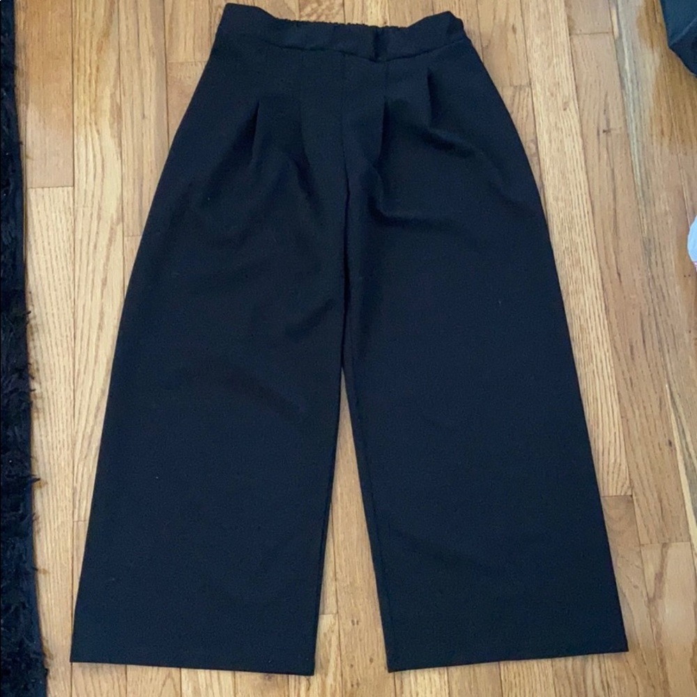Black slacks cropped